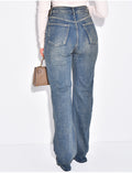 Jeans coupe droite stretchy à boutonnière croisée
