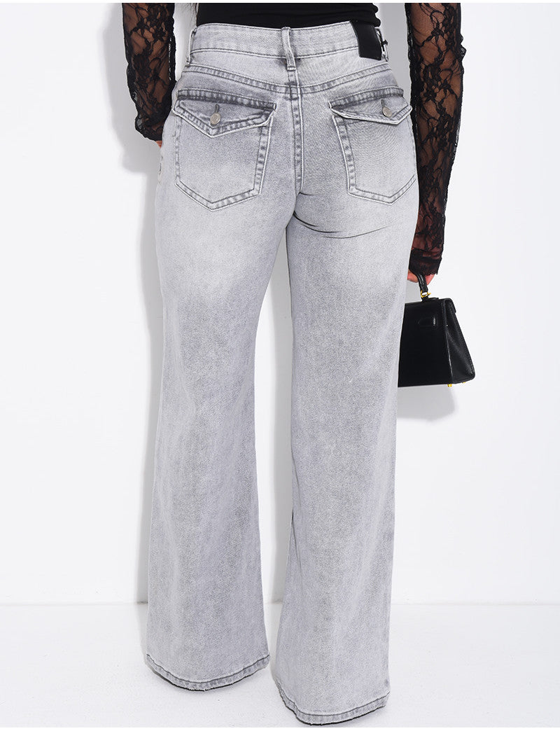 Jeans taille basse wide leg à poches rabattues