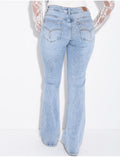 Jeans taille basse flare à broderies sur les poches