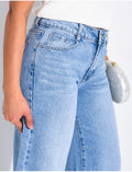 Jeans coupe large taille moyenne délavé