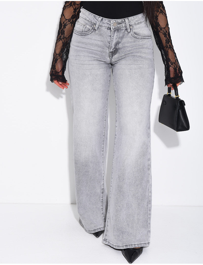 Jeans taille basse wide leg à poches rabattues