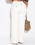 Jeans taille basse wide leg à poches rabattues