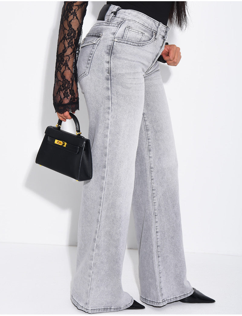 Jeans taille basse wide leg à poches rabattues
