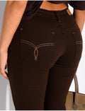 Jeans taille basse flare à broderies sur les poches