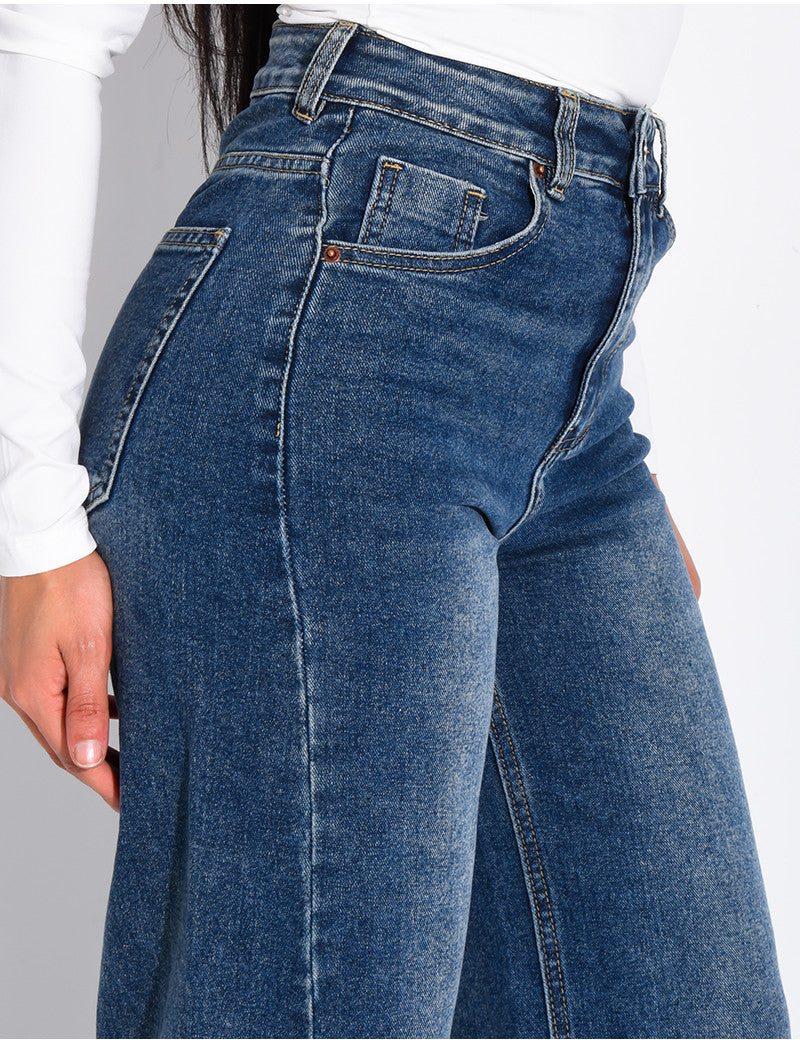 Jeans coupe large stretchy avec revers