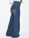 Jeans coupe large stretchy avec revers