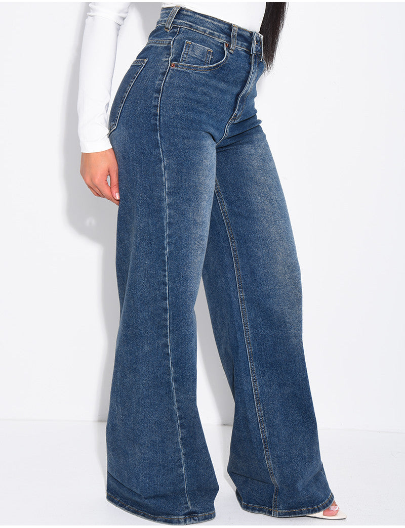 Jeans coupe large stretchy avec revers