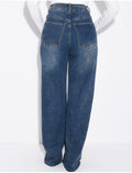 Jeans coupe large stretchy avec revers
