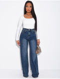 Jeans coupe large stretchy avec revers