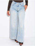 Jeans coupe large stretch à délavage vintage