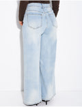 Jeans coupe large stretch à délavage vintage