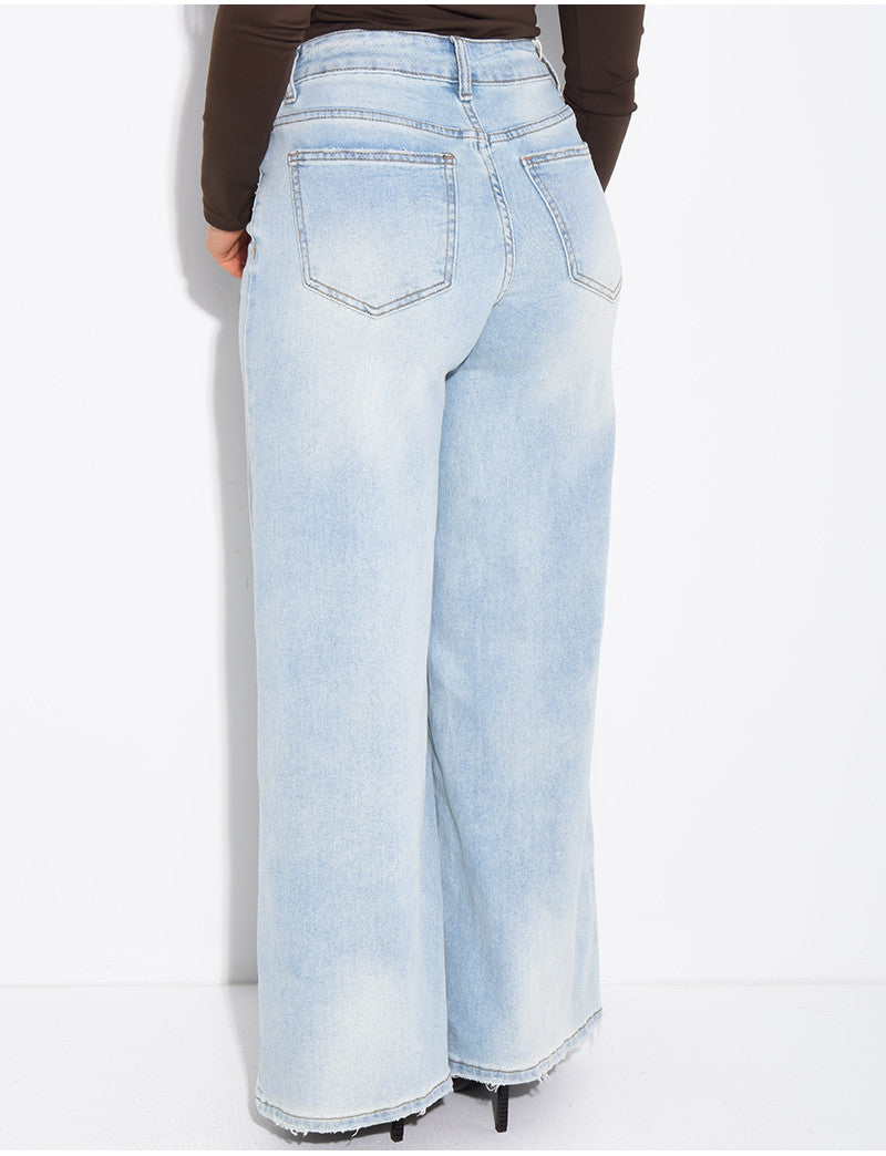 Jeans coupe large stretch à délavage vintage