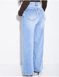 Jeans coupe large stretch à délavage clair