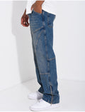 Jeans délavé à fermeture éclaire aux chevilles
