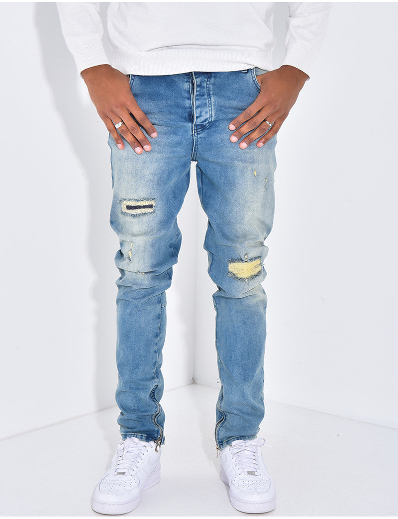 Jeans destroy à fermeture éclaire aux chevilles
