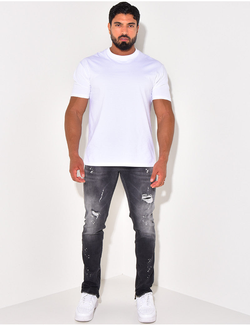 Jeans destroy à zip aux chevilles