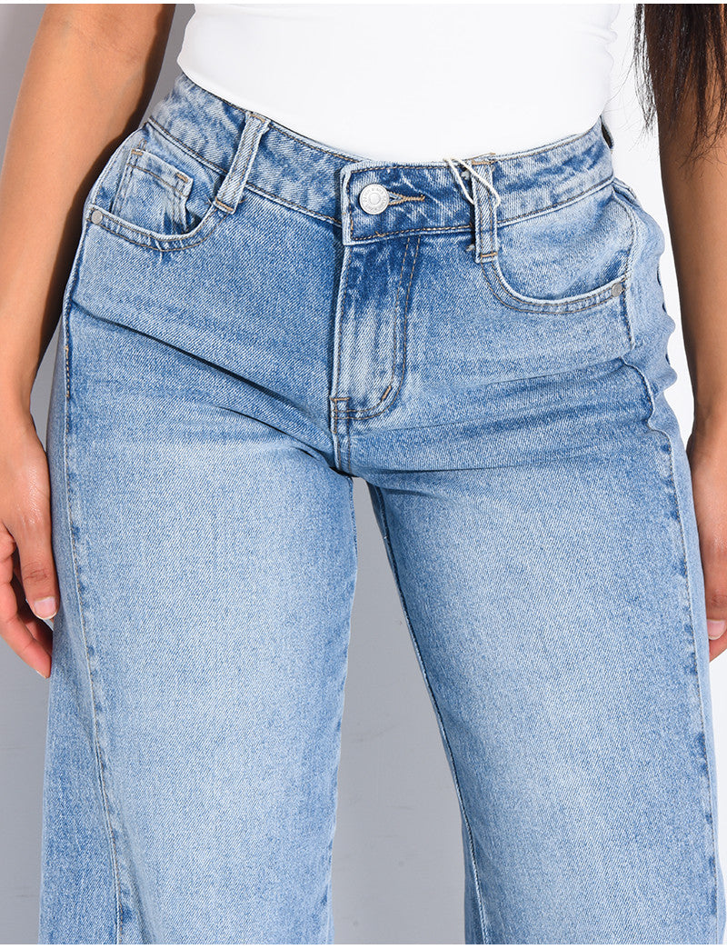 Jeans délavé à pinces à la taille
