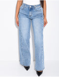 Jeans délavé à pinces à la taille