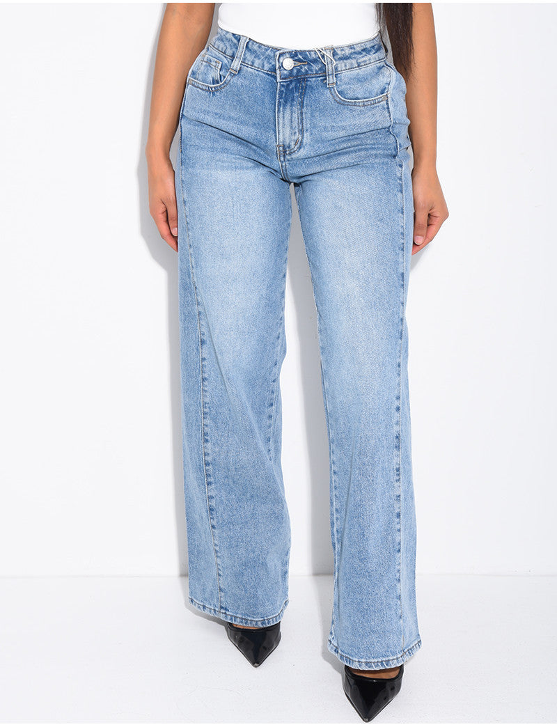 Jeans délavé à pinces à la taille