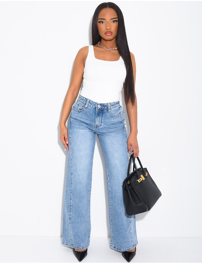 Jeans délavé à pinces à la taille