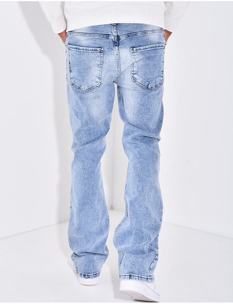 Jeans flare destroy à couture contrastante