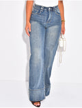 Jeans coupe large stretchy avec revers