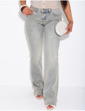 Jeans flare taille basse à délavage vintage