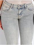 Jeans flare taille basse à délavage vintage