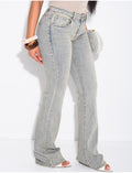 Jeans flare taille basse à délavage vintage