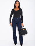 jeans flare stretch à poches sur l'avant
