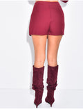 Jupe short taille haute à boutons dorés
