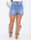 Jupe short en jeans à boutonnière croisée