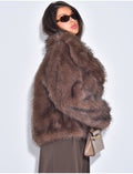 Veste courte en fausse fourrure
