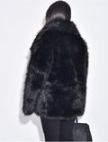 Manteau mi-long en fausse fourrure à col rabattu