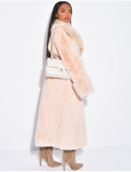 Manteau en fausse fourrure à ceinture