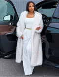 Manteau oversize à fourrure premium