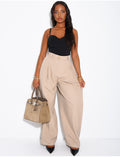 Pantalon de tailleur bouffant à boutons aux chevilles