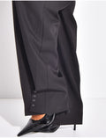 Pantalon de tailleur à boutons aux chevilles