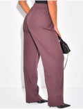 Pantalon de tailleur à boutons aux chevilles
