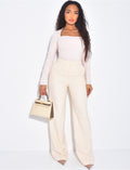 Pantalon de tailleur en laine assortie au manteau cintré