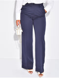 Pantalon de tailleur taille haute à revers