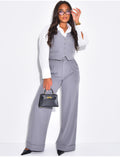 Pantalon de tailleur taille haute à revers