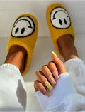 Pantoufles à smiley imprimé jaunes