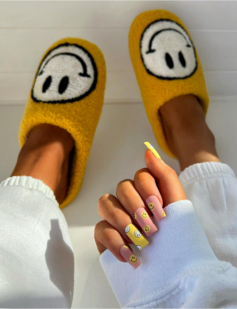 Pantoufles à smiley imprimé jaunes