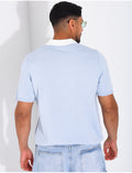 Polo à motif brodé