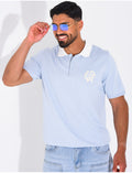 Polo à motif brodé