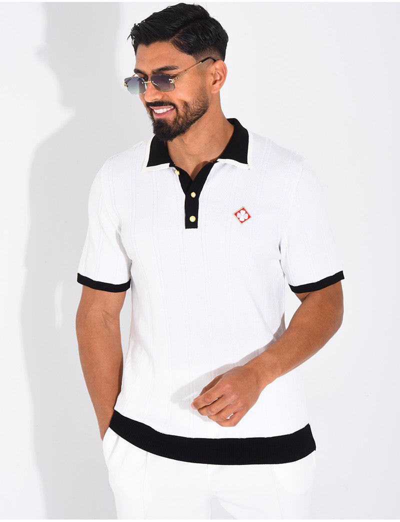Polo côtelé à trèfle et boutons perle