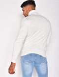 Pull col roulé