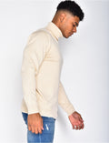 Pull col roulé