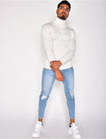 Pull col roulé